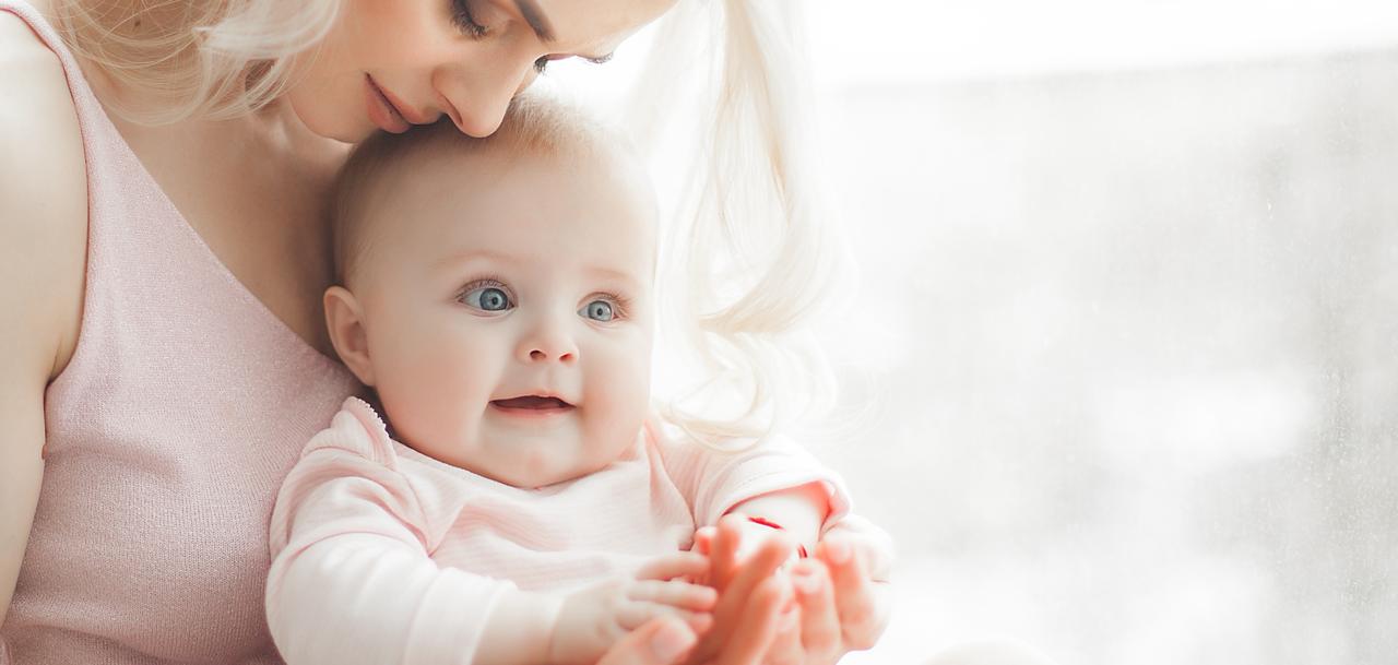 Mother holding her baby